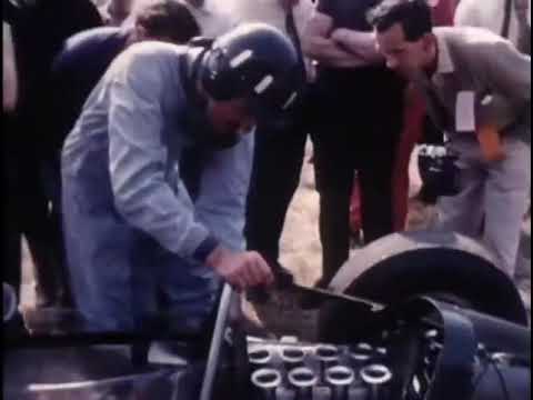 Graham Hill Repairs his own F1 Car with fans Help