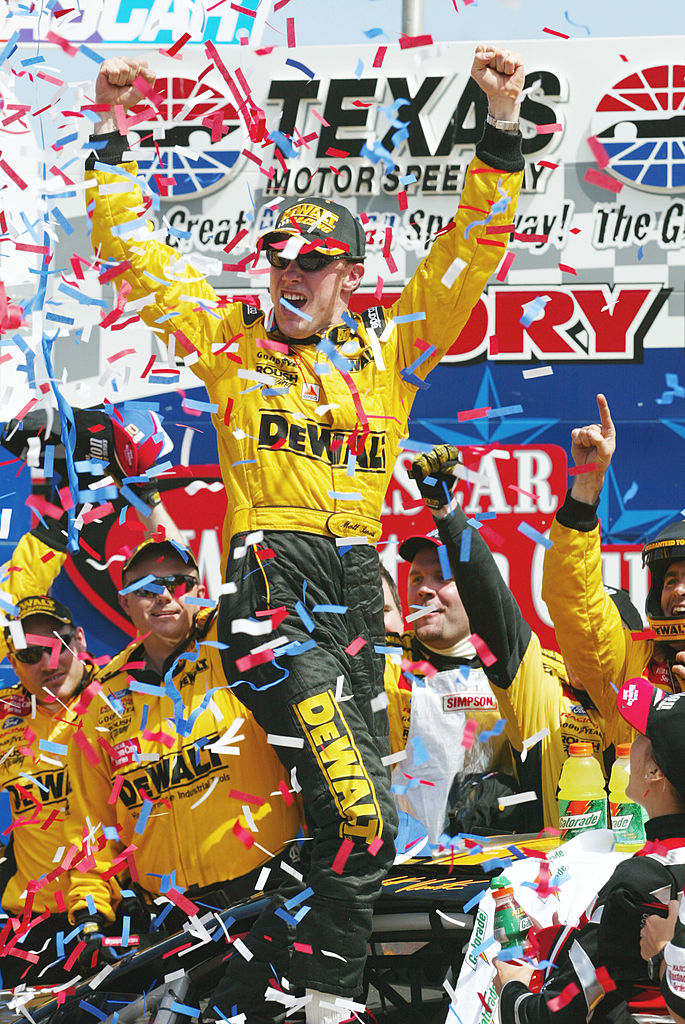 8 APR 2002. Matt Kenseth celebrates in victory circle after winning the Samsung/Radio Shack 500, round 7 of the NASCAR Winston Cup Series at the Texas Motor Speedway in Fort Worth, Texas. Mandatory Credit: Robert Laberge/Getty Images.