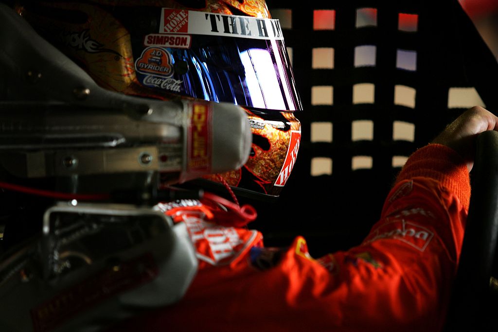 LOUDON, NH - JULY 15: Tony Stewart, driver of the #20 The Home Depot, sits in his car prior to practice for the NASCAR Nextel Cup Series Lenox Industrial Tools 300 on July 15, 2006 at New Hampshire International Speedway in Loudon, New Hampshire. (Photo by Jamie Squire/Getty Images) | Getty Images
