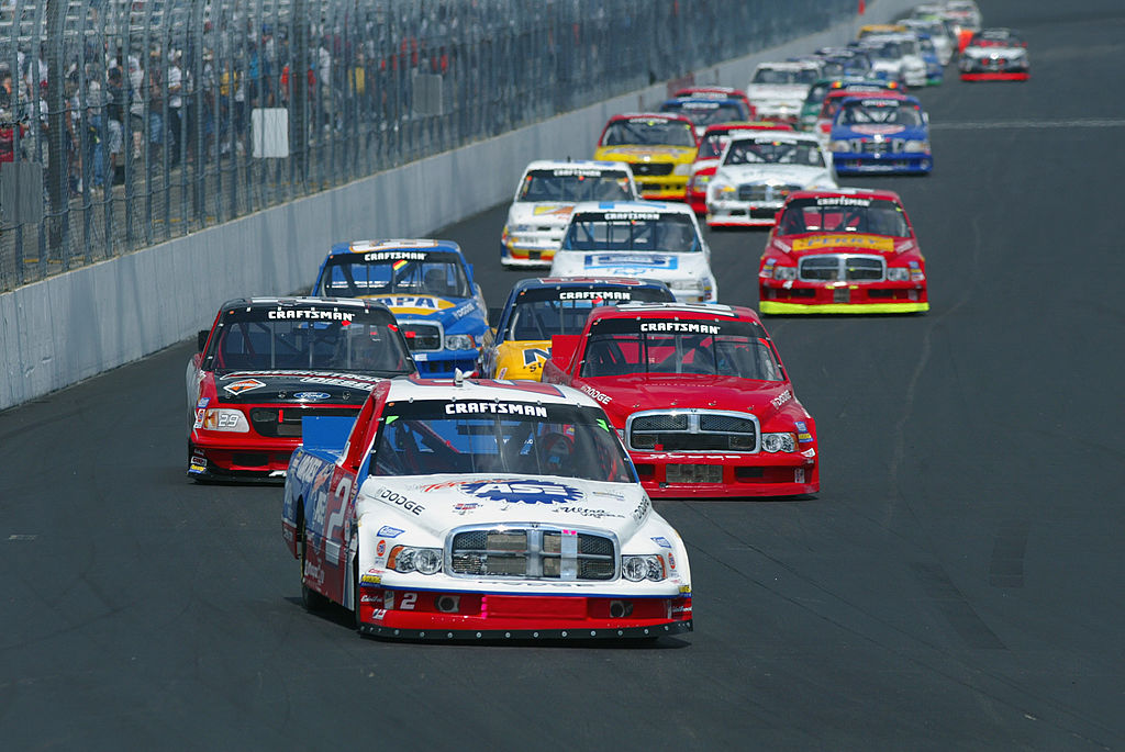 LOUDON, NH - JULY 20: Jason Leffler leads a pack of trucks in his #2 Carquest Racing Dodge Ram during the NASCAR Craftsman Truck Series Series New England 200 on July 20, 2002 at the New Hampshire International Speedway, in Loudon, New Hampshire. (Photo by Robert Laberge/Getty Images)