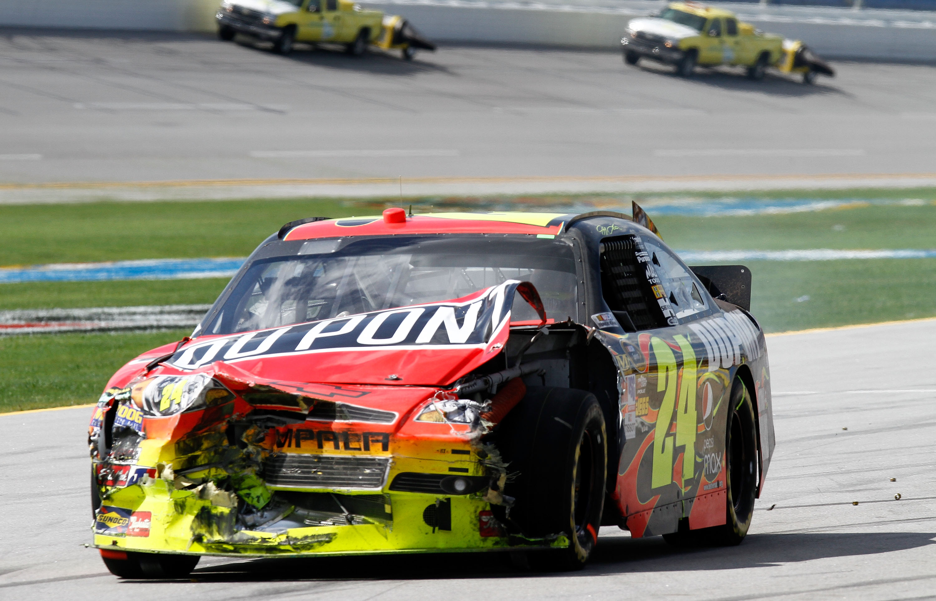 TALLADEGA, AL - APRIL 25: Jeff Gordon drives the #24 DuPont Chevrolet on pit road after suffering damage in a multicar incident in the NASCAR Sprint Cup Series Aaron